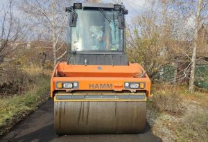 Нові бордюри та чисті дороги: у Запоріжжі триває ремонт доріг (ФОТО)