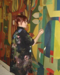 17-річна художниця в Запоріжжі відновила 7-метровий стінопис